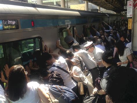 Japanese Commuters Push 32 Ton Train To Free Woman Cbs News