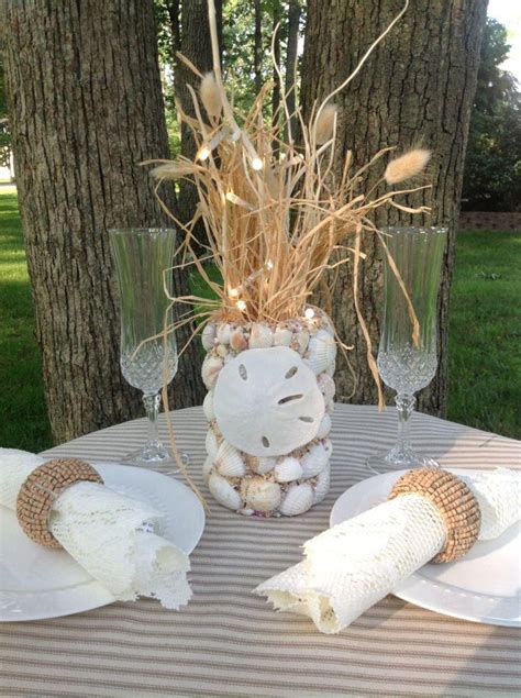 Shell on a sandy tropical beach. Top 31 Beach Theme Wedding Centerpieces Ideas | Table ...