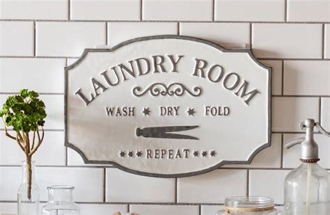 embossed metal laundry room sign in 2020 laundry room signs room signs vintage laundry sign
