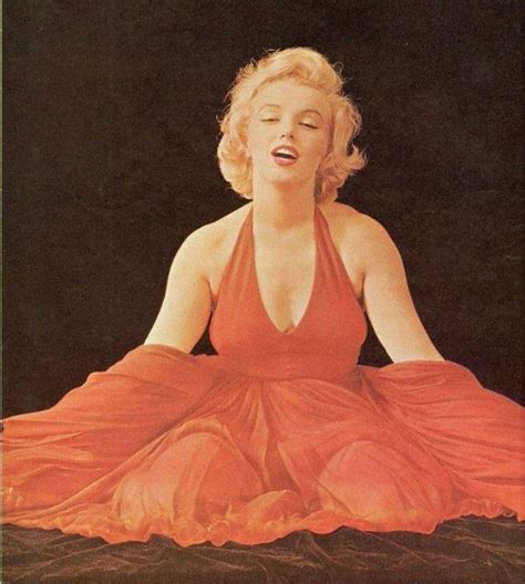 behind the scenes photos of marilyn monroe playfully poses during the the red dress sitting