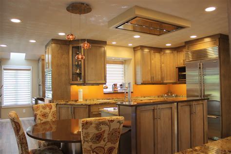 Maybe you would like to learn more about one of these? Shaker Kitchen- induction cooktop in island, built in wine ...