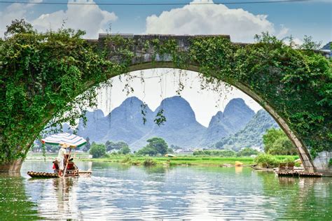 Dragon Bridge Yangshuo China Water Under The Bridge Wonders Of The