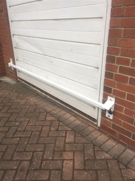 Are you struggling to deal with broken springs, unreliable openers, squeaking rollers. Garage Door Security Bar - Heavy Duty | Atlantic Fabrications
