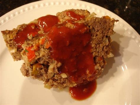 Serve slices of the meatloaf with some tomato sauce spooned over. Meatloaf with Tomato Sauce | Meatloaf sauce, Meatloaf with tomato sauce, Meatloaf