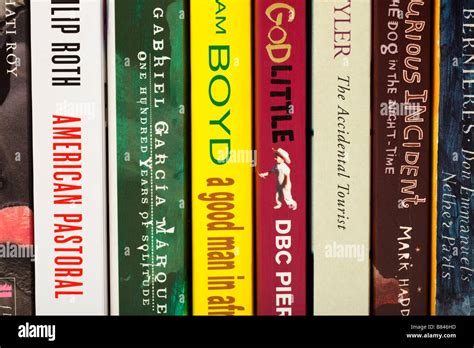 Close Up Row Showing The Spines Of Literary Fiction Books Novels Stock