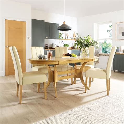 Townhouse Oval Oak Extending Dining Table With 6 Carrick Ivory Leather
