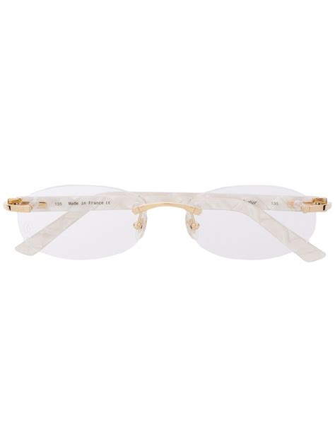 cartier eyewear c décor rimless oval frame glasses farfetch