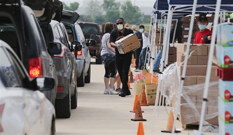 6000 Families Line Up In Cars For Hours At Food Bank As