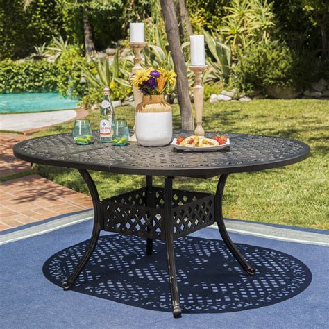 Features include hand antiqued powder coat finish sealed with a clear coat to choose an outdoor dining set with matching chairs, or mix and match your seating for an eclectic look. Carrie Outdoor 7 Piece Aluminum Dining Set with Expandable ...