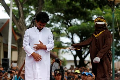 Two Men Publicly Caned In Indonesia For Having Gay Sex Photosimages