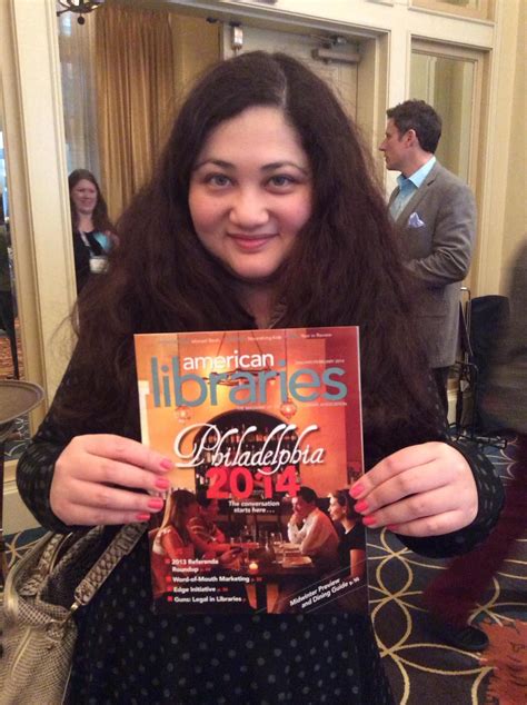 Gabrielle Zevin Author Of The Storied Life Of Aj Fikry Poses With The Janfeb 2014 Issue Of