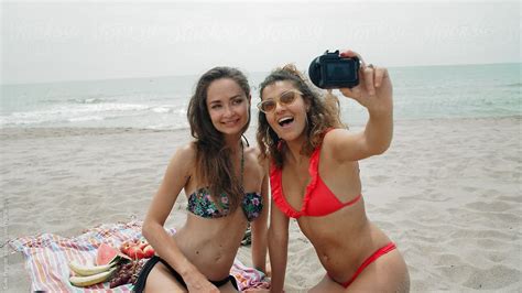 Girls In Bikini Making Selfie On Beach By Stocksy Contributor Guille Faingold Stocksy
