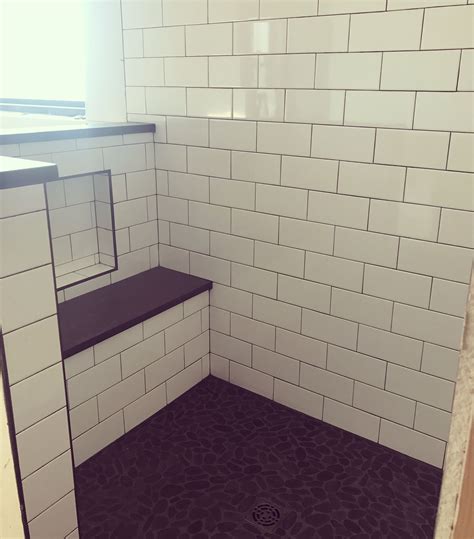 4 X 8 Subway Tiled Shower With Stone Floor And Bench Farmhouse