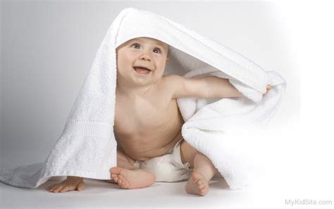 Little Baby Under White Towel