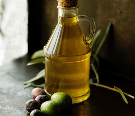 Para qué sirve tomar aceite de oliva con limón