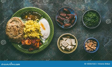 Various Indian Foods In Bowls On Dark Rustic Background Stock Photo
