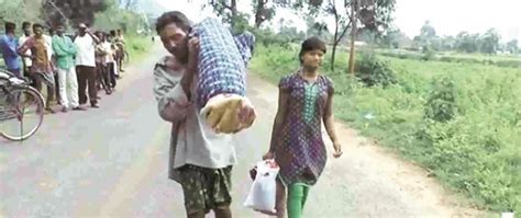 India Hospital Denies Mortuary Van Husband Walks 10 Km With Wifes Corpse On His Shoulder