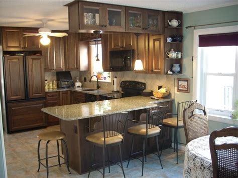 Enhance a kitchen layout with a peninsula. Peninsula wall cabinets & Decora mink cherry cabinets. | Kitchen renovation, Kitchen layout ...