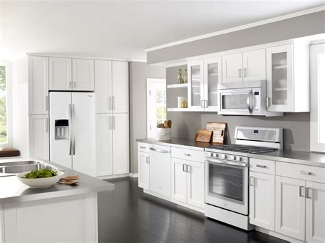 The white upper cabinets combined with the white subway tile keeps things feeling open and airy. Getting the Most Our of Your New Kitchen Appliances ...