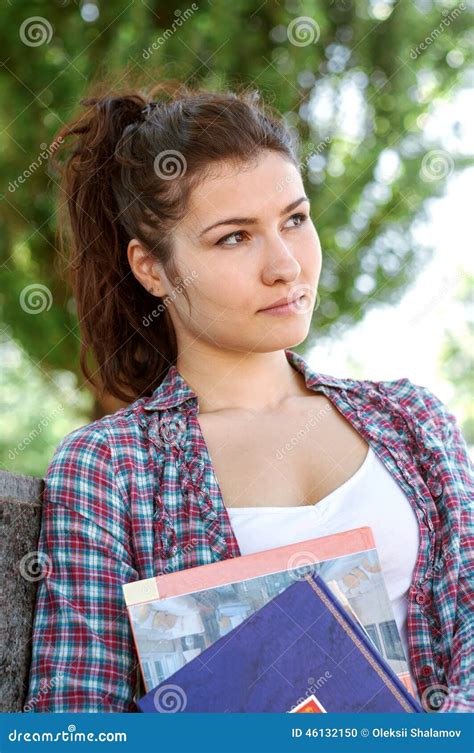 Girl Standing With Books In Her Hands Stock Photo Image Of Cute
