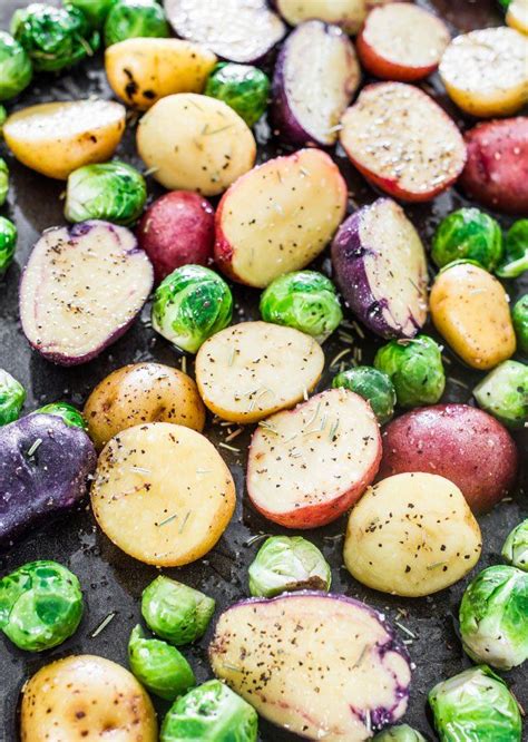 Potatoes and root vegetables go with steak like peanut butter and jelly. Rosemary Balsamic Baby Potatoes and Brussels Sprouts oven roasted to perfection, a simple, yet ...