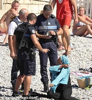 Armed French Police Force Muslim Woman To Remove Her Burkini On Nice