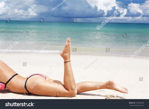 Women S Beautiful Sexy Legs On The Beach Stock Photo