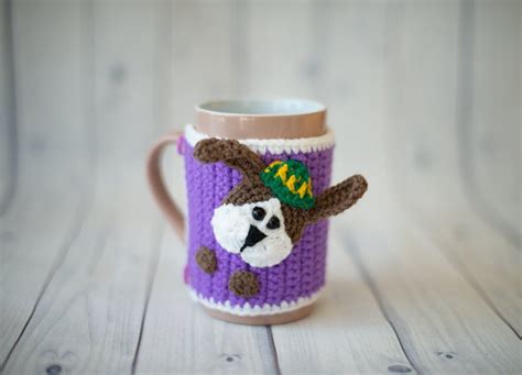 My husband & i handmake each and every one! Coffee mug holder knitted yarn Mug cozy crochet dog purple ...