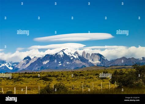 Unusual Lenticular Cloud Formation Over The Torres Del Paine Mountain