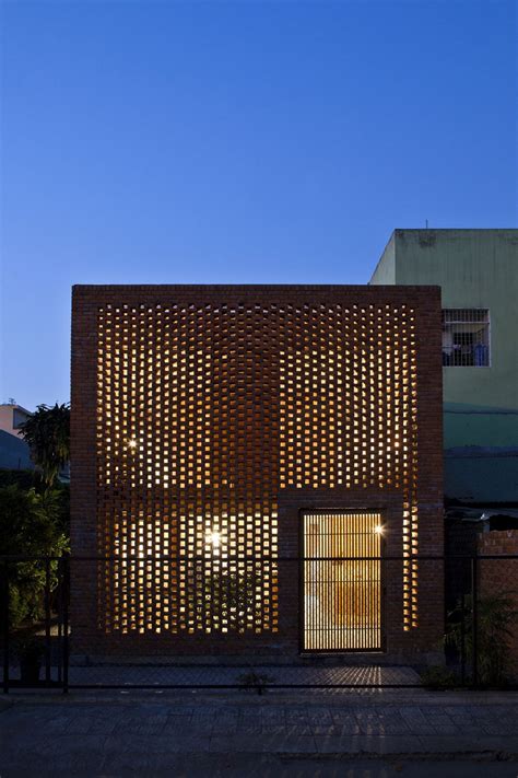 Perforated Brick Facades Make A Home More Stylish And Energy Efficient