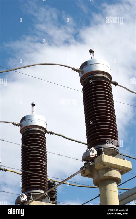 Ceramic Insulators On A High Voltage Power Line Detail Close Up Stock