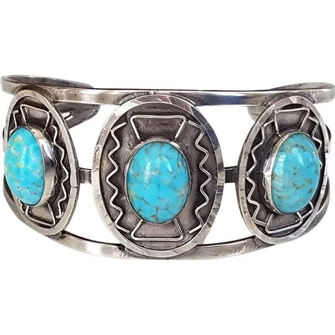 vintage-mexican-sterling-turquoise-stone-aztec-design-wide-cuff-bracelet,-small-size-www