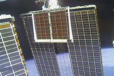 Take Spacewalking Astronauts Install New Solar Panel