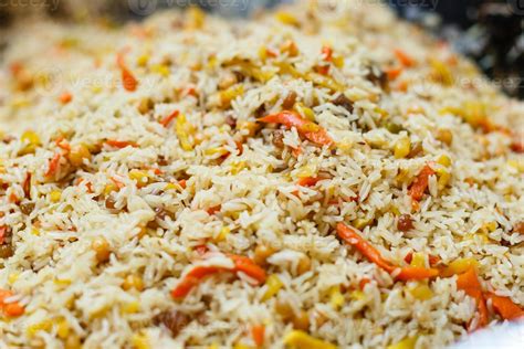 Rice Pilaf With Meat Carrot And Onion Background Stock Photo