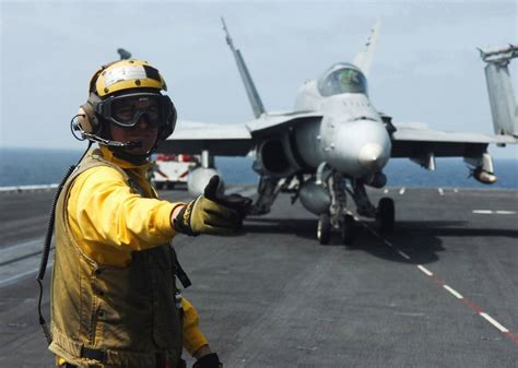 What The Color Coded Uniforms Of Us Aircraft Carrier Crews Mean