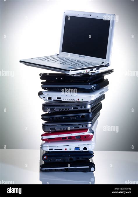 Pile Of Small Laptop Computers Stock Photo Alamy