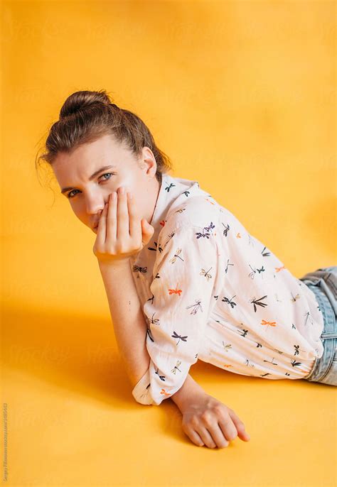 Portrait Of Teen Model On Yellow Background By Stocksy Contributor