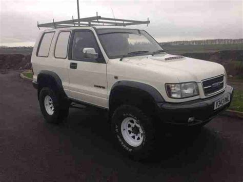 Use the ixolino drill to change the tires and customize the body. Isuzu 1999 TROOPER TURBO DIESEL WHITE MINI MONSTER TRUCK ...