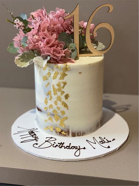 Semi Naked Cake With Gold Leaf And Fresh Flowers