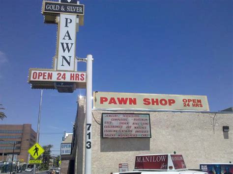 Standing Outside The Gold And Silver Pawn Shop
