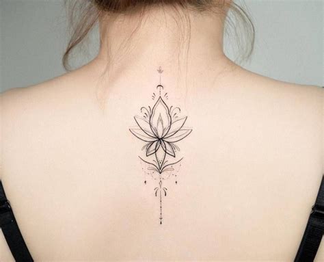 Ornamental Lotus Flower Tattoo On The Upper Back Neck Tattoos Women