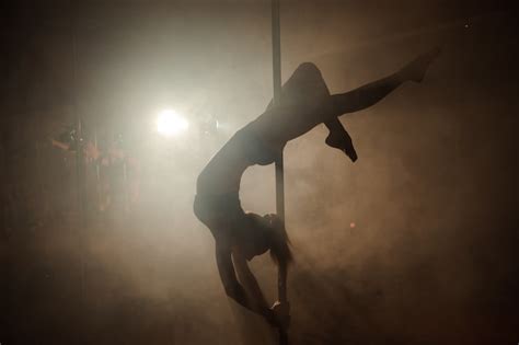 Premium Photo Attractive Sexy Woman On The Pole Dancer Performing