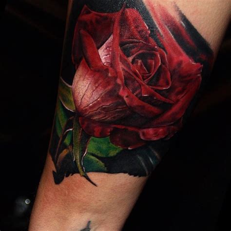 Realistic Style Rose Tattoo On The Right Upper Arm