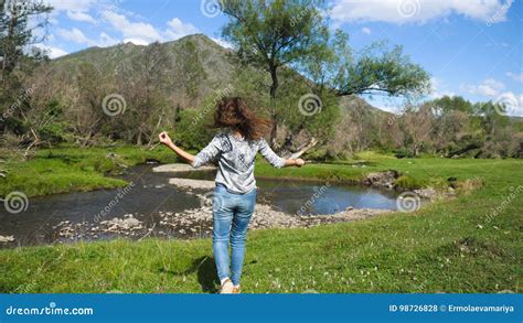 Hiking Woman Jumping In Beautiful Landscape Nature Stock Photo Image
