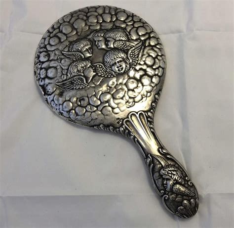 Edwardian Sterling Silver Hand Mirror With Cherubs Personal Grooming