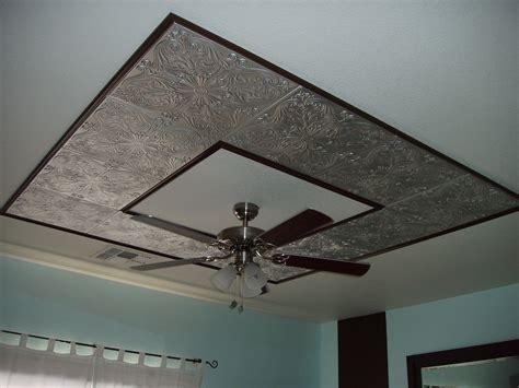 Inexpensive Styrofoam ceiling tiles painted with water based metallic