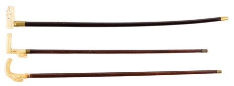 This Lot Of Three Ivory Canes Includes A Sword Cane With A Carved Ivory