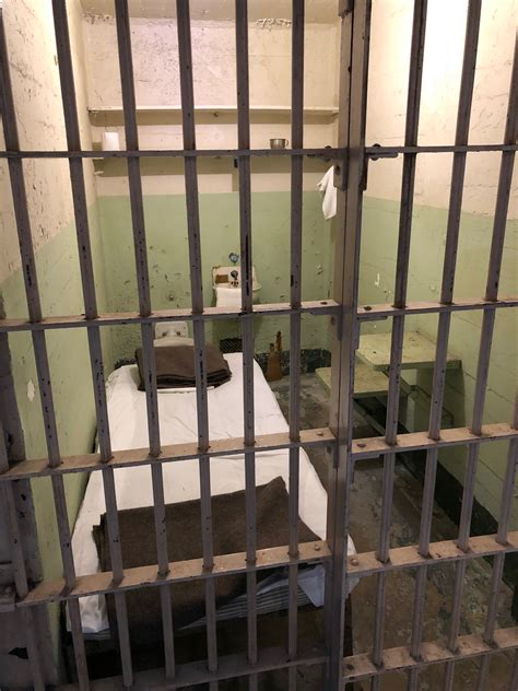 Interior in the prison of peter and paul fortress in saint petersburg, russia, with a little window, vintage lamp and iron bed. 4 Steps to Break Out of Your Leadership Prison Cell | Leading with Trust