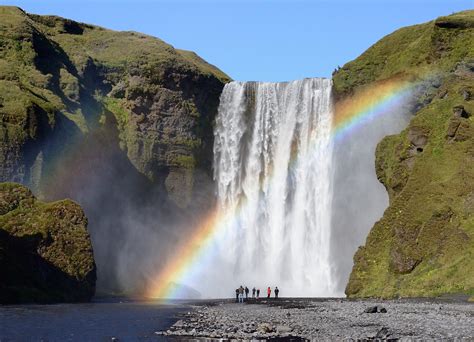 Iceland Double Rainbow And Iconic Waterfall