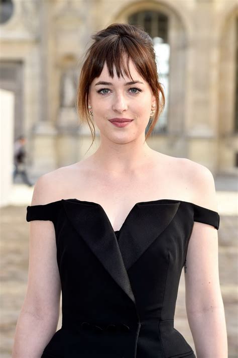 dakota johnson showing big cleavage in black jumpsuit at christian dior fashion porn pictures